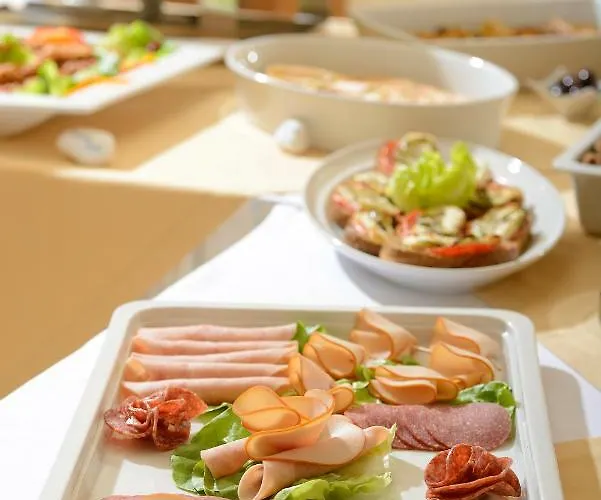 塔马瑞克斯德尔麦套房酒店 酒店